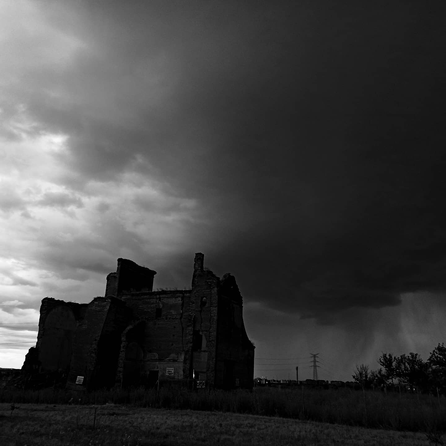 A ruined church in black and white