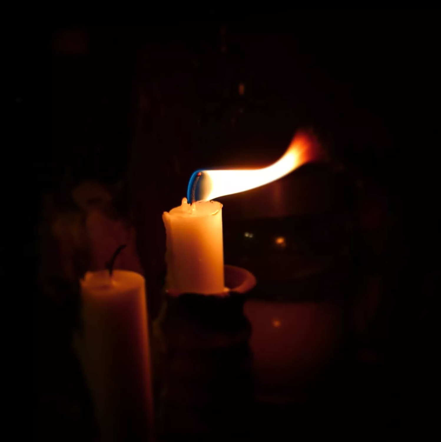 a candle in the dark